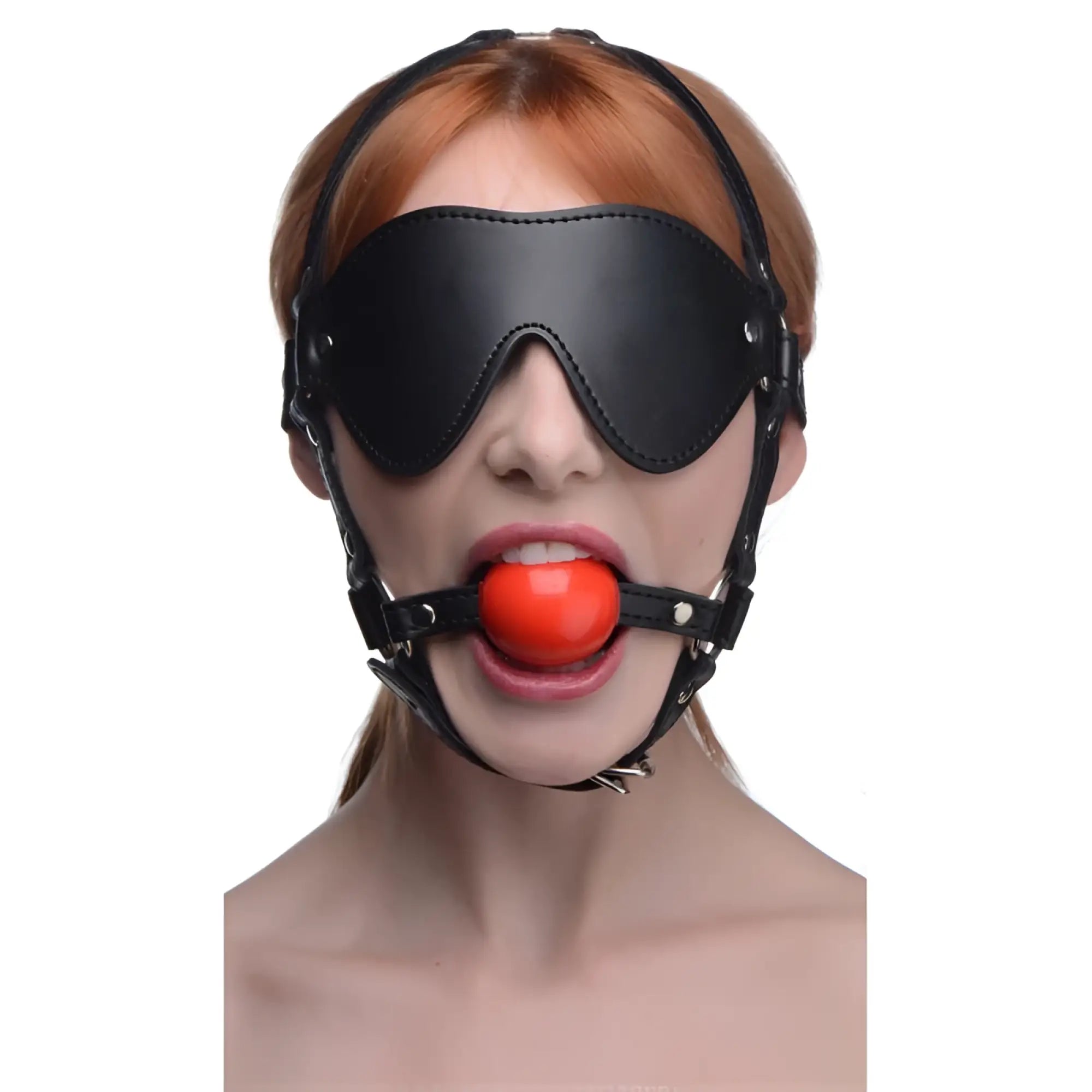 Black leather muzzle with red ball gag designed as a strict blindfold harness for restraint and sensory play