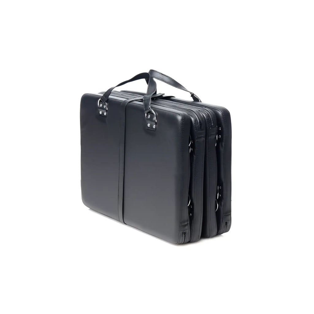 Black leather briefcase with textured surface and dual zippers from strict bondage board black xl collection