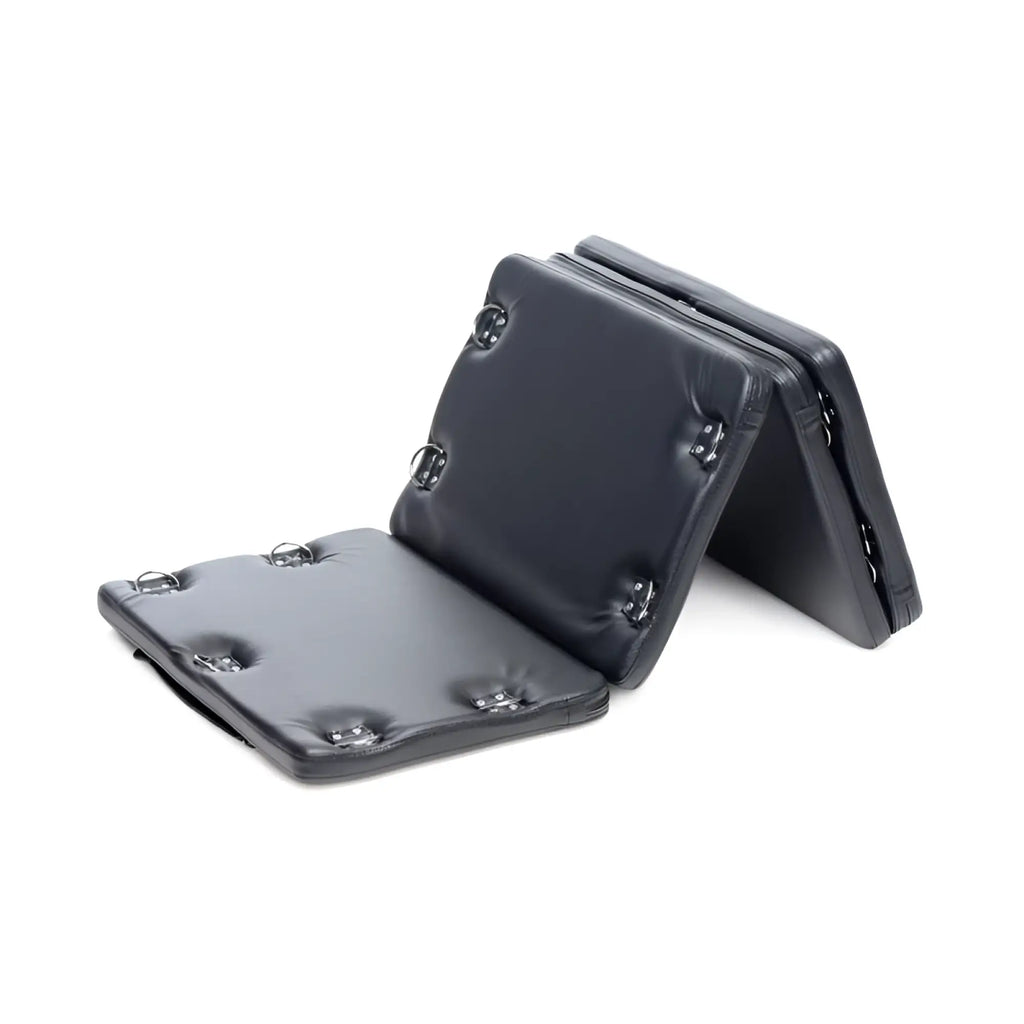 Black leather folding restraint pad with metal d-rings and reinforced stitching for strict bondage board black xl