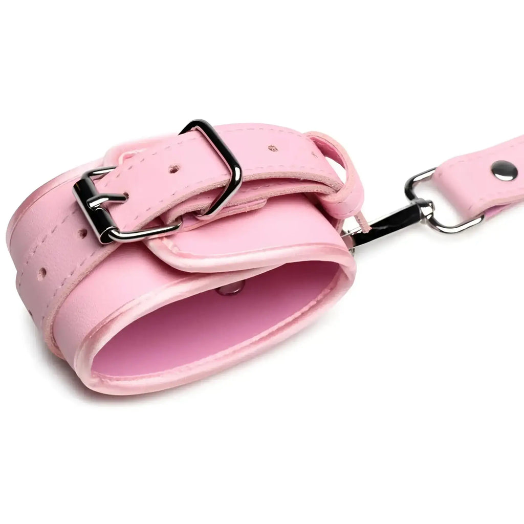 Pink leather strict bondage harness with black metal buckle and attached chain featuring decorative bows size m/l
