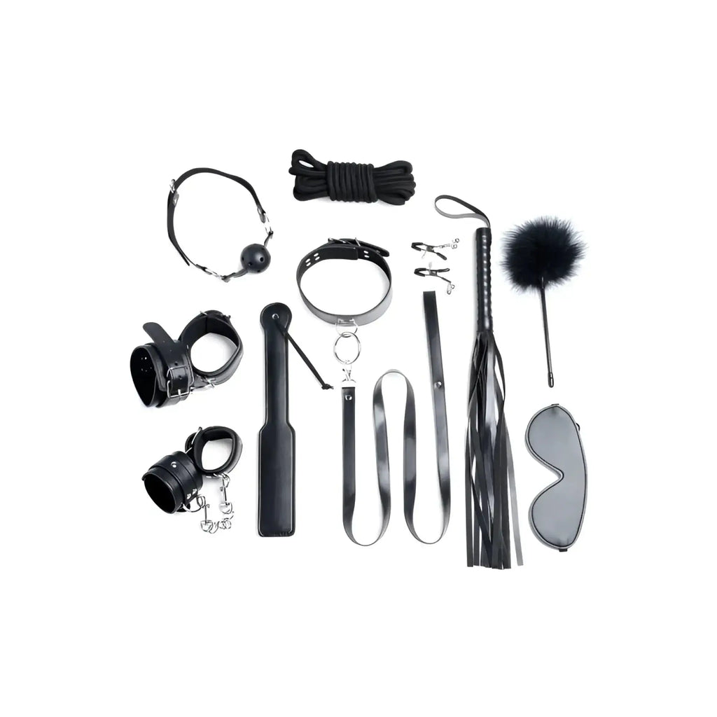 Black leather bondage set with metal hardware and a fluffy black feathered whip from Strict Deluxe 10 Pc Bondage Set Black