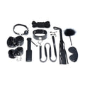 Black leather bondage set with metal hardware and a fluffy feathered whip end from strict deluxe 10 pc set
