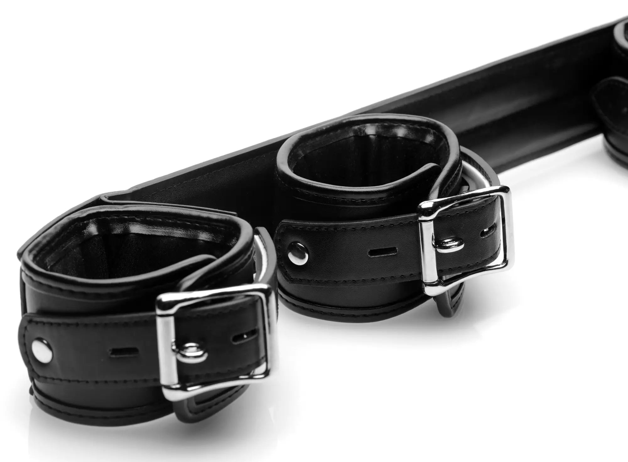 Black leather wrist cuffs with silver metal buckles featured in the strict deluxe rigid spreader bar product