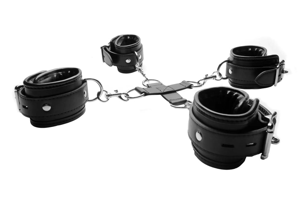 Black leather strict hogtie restraint with silver metal chains and buckles for secure bondage use