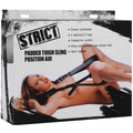 Strict padded thigh sling position aid in black padded material with attached d-rings and neck support