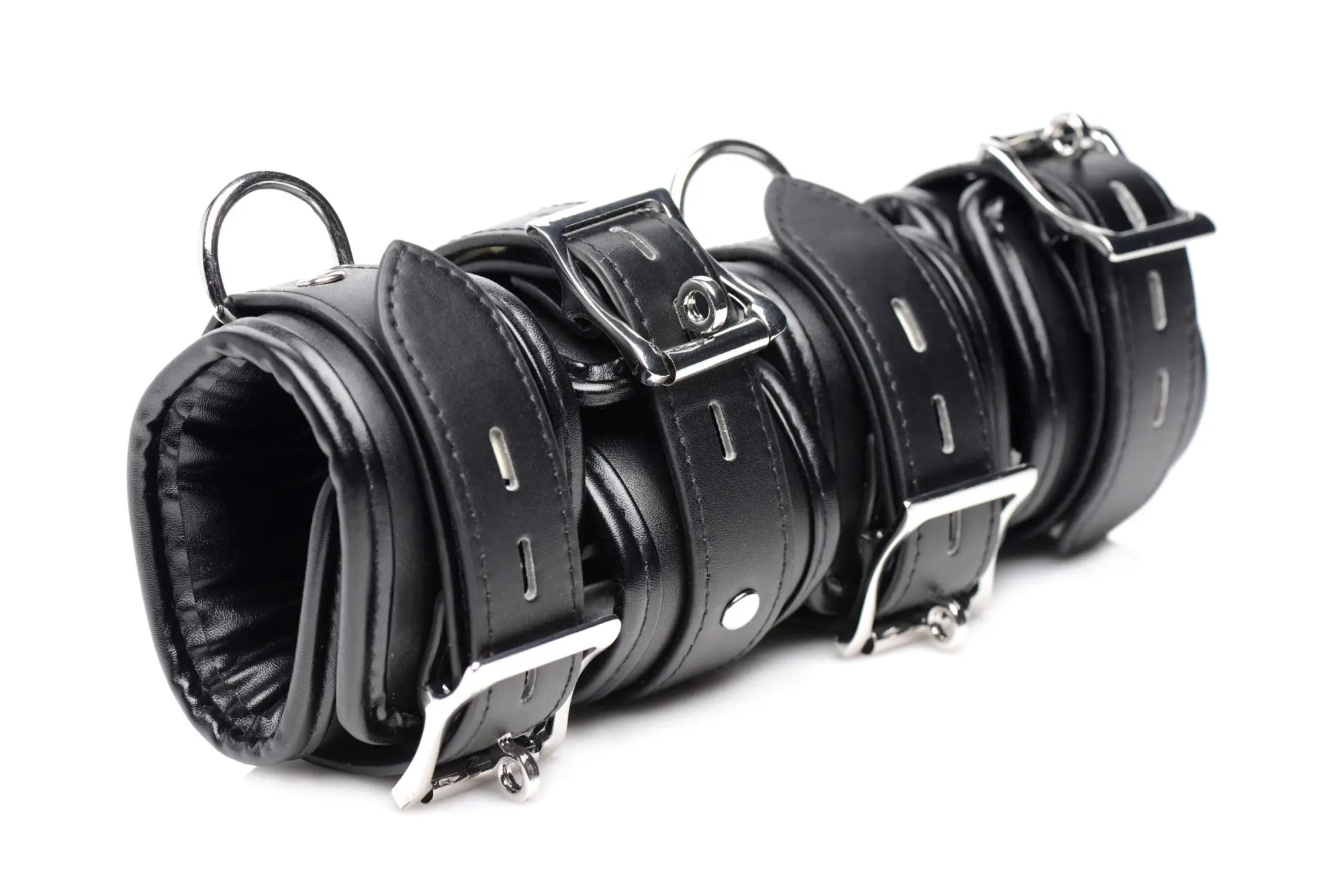 Black leather wrist and ankle restraint set with silver metal buckles for strict slave bondage use