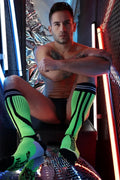 Neon green and black striped sucker socks with bold modern design for athletic use
