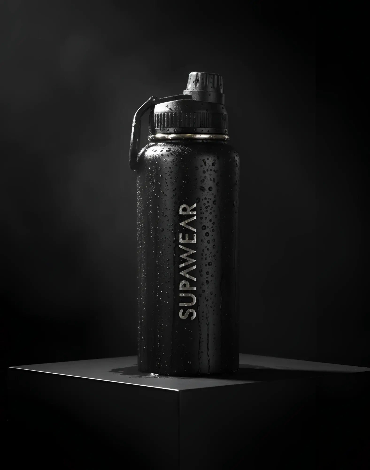 Black Supawear 1L water bottle with textured matte finish and silver logo for durable everyday hydration
