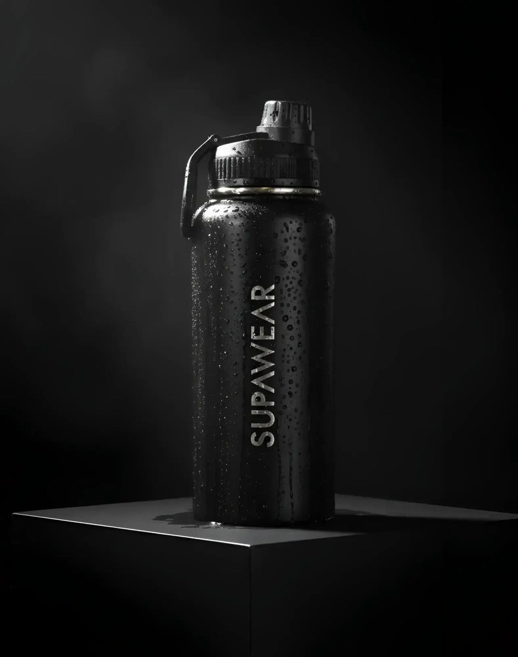 Black Supawear 1L water bottle with textured matte finish and silver logo for durable everyday hydration