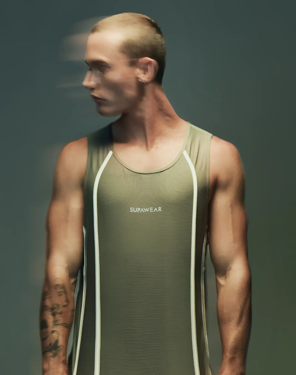 SupaWear Airflow singlet green olive tank top with white vertical trim and subtle textured fabric front view