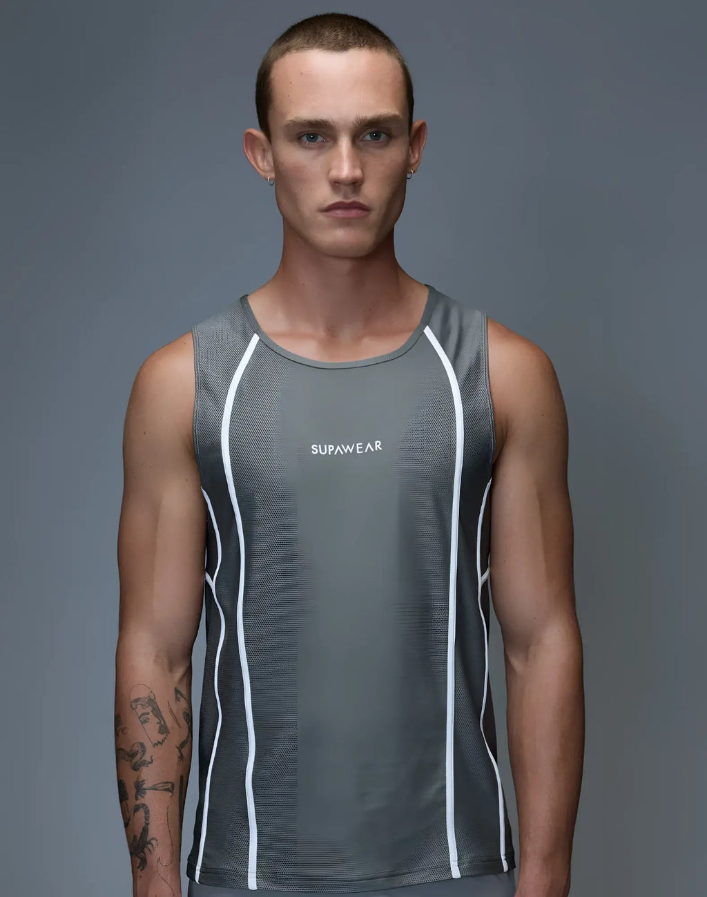 Gray supawear airflow singlet with white side piping and logo designed for athletic performance and comfort