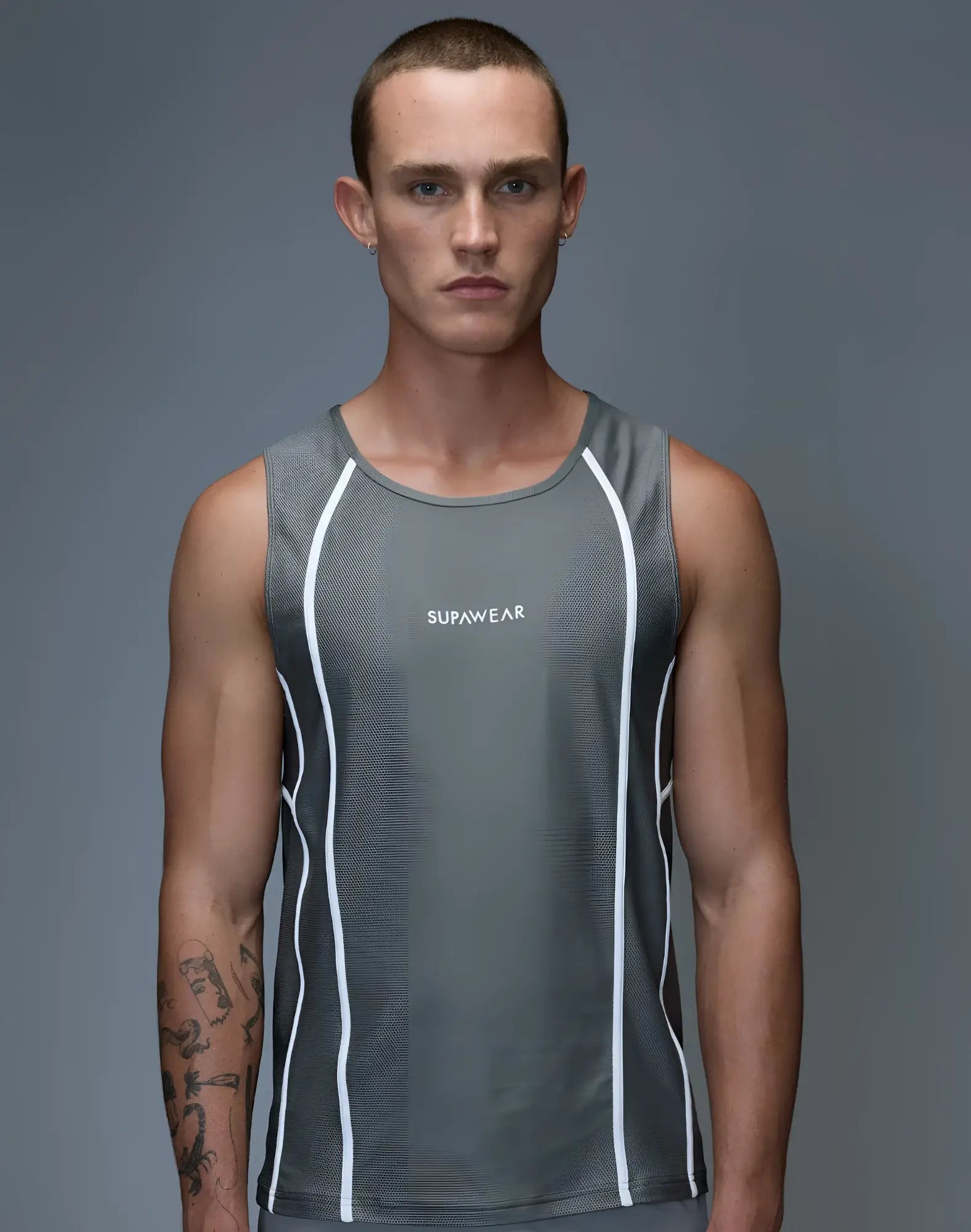 Gray supawear airflow singlet with white side piping and logo designed for athletic performance and comfort