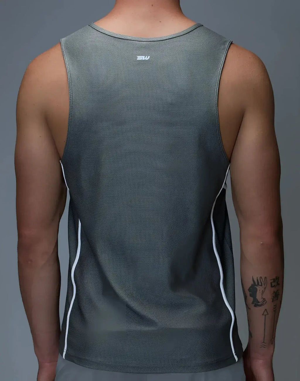 Gray SUPAWEAR airflow singlet athletic tank top with white side stripes and small logo at neckline