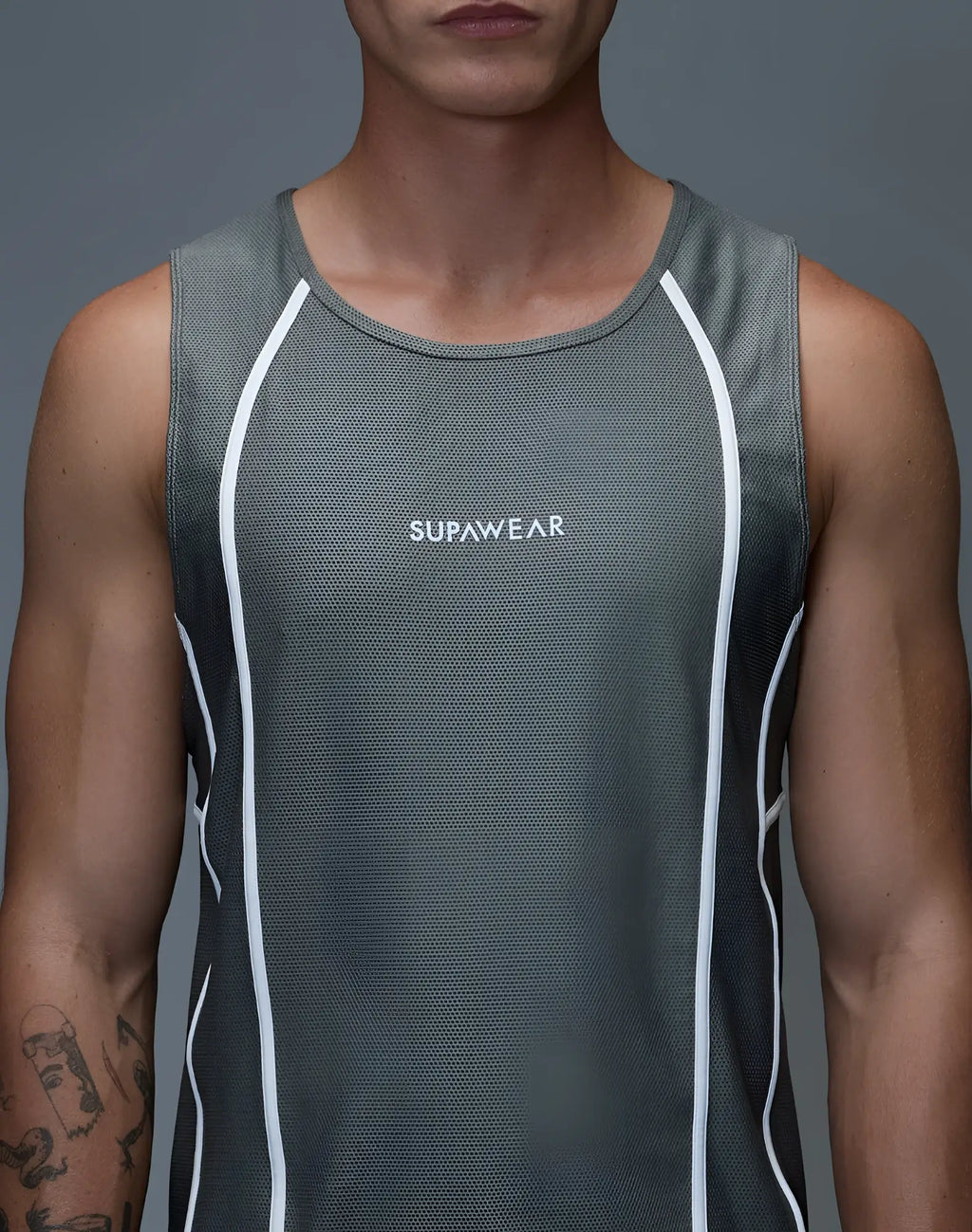 Gray mesh supawear airflow singlet with white piping and embroidered logo on chest for breathable workout wear