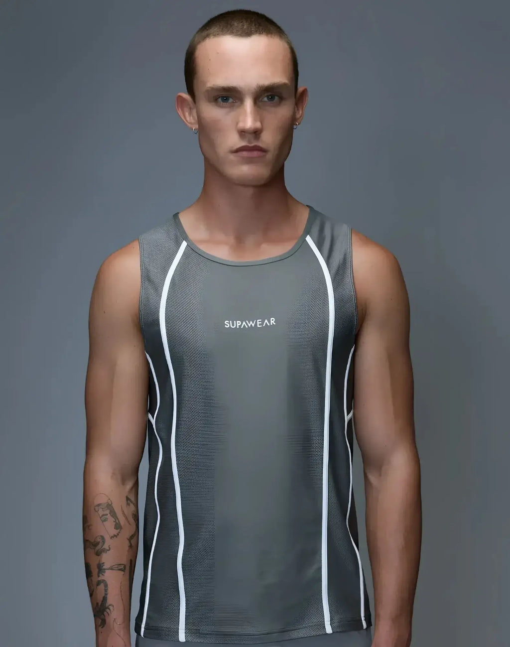 Gray supawear airflow singlet with white side piping and logo designed for athletic performance and comfort