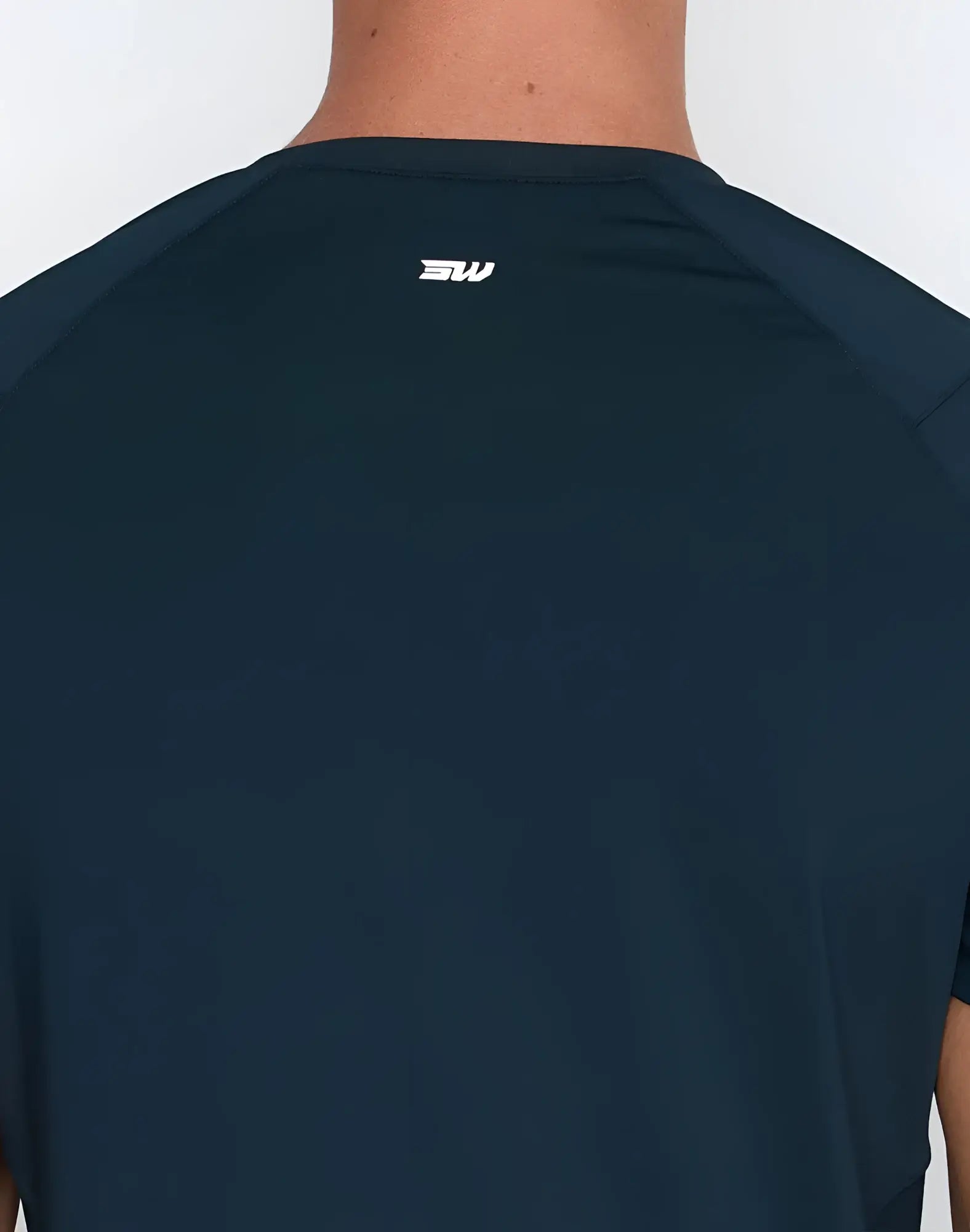 Dark navy SUPAWEAR contouring athletic t-shirt with subtle white logo at neckline designed for performance wear