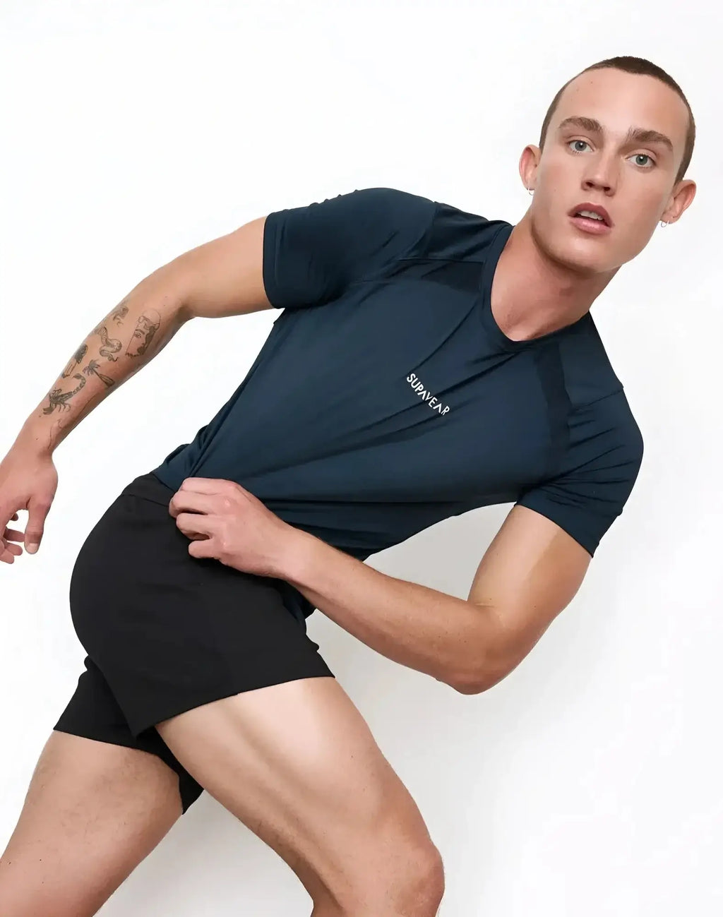 Dark navy blue short-sleeved athletic contouring t-shirt with subtle side paneling and white survivar logo on chest