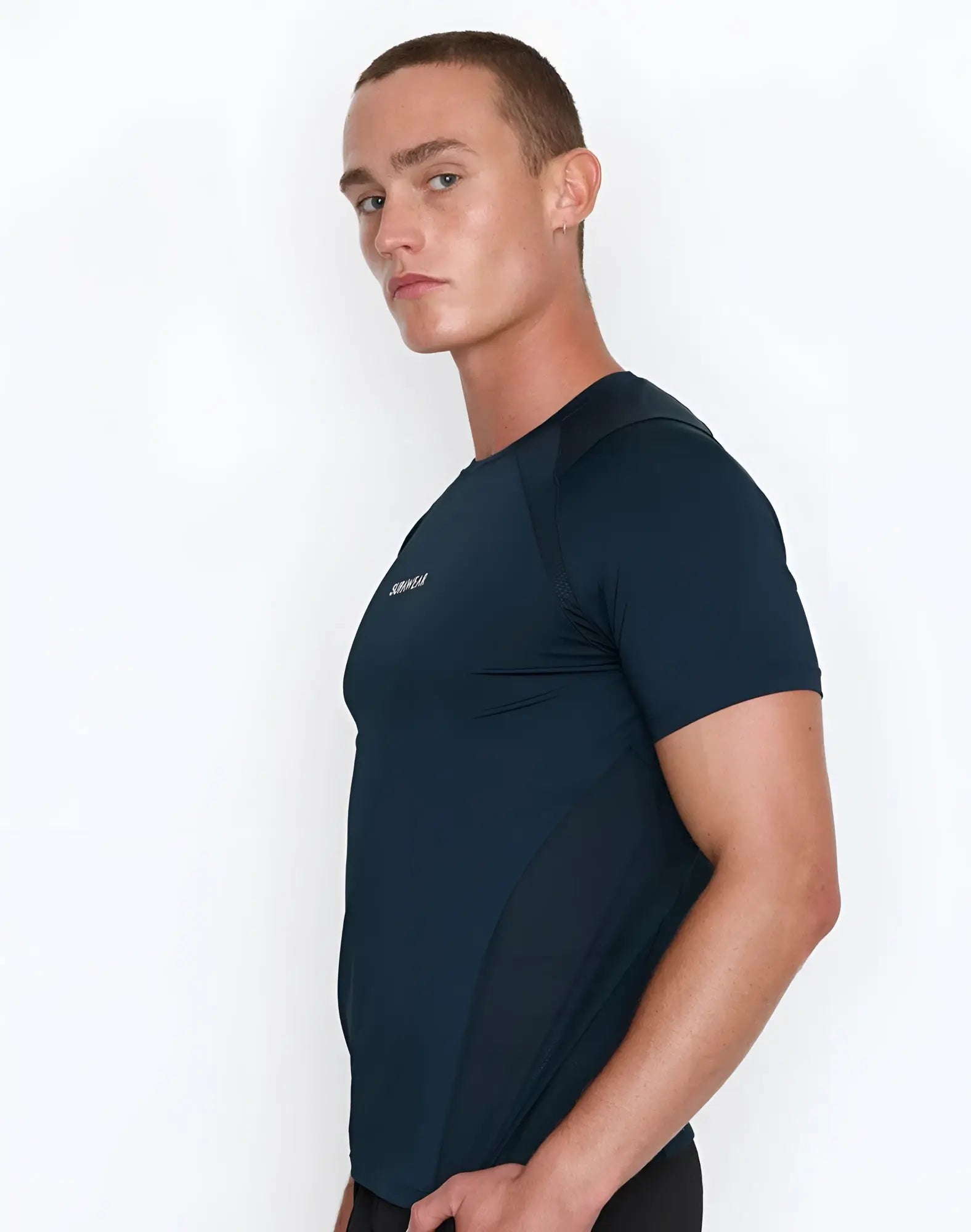 Dark navy blue short-sleeved SUPAWEAR contouring t-shirt with subtle texture and minimal chest branding