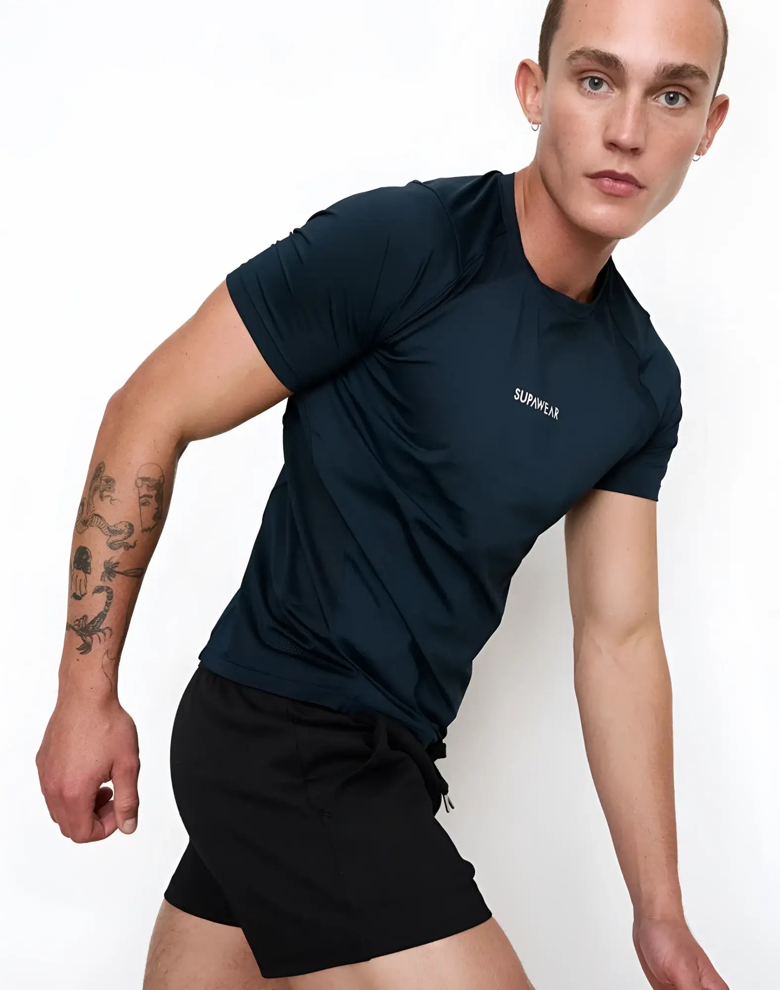 Dark navy short-sleeved supawear contouring t-shirt with subtle white logo designed for athletic use