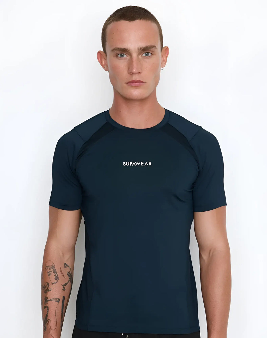Navy blue short-sleeved rash guard with white supawear logo on chest from the SUPAWEAR Contouring T-Shirt black collection