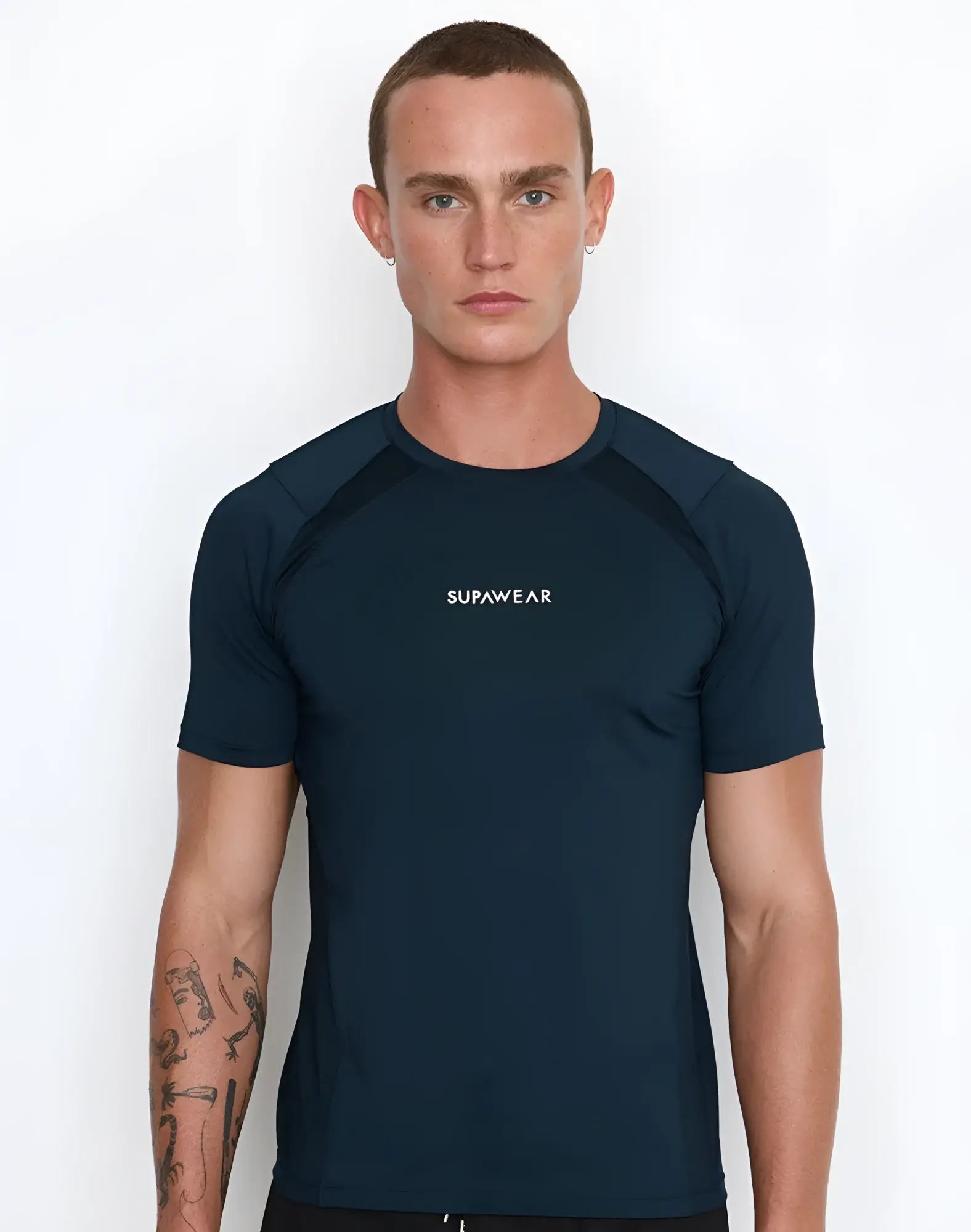 Navy blue short-sleeved rash guard with white supawear logo on chest from the SUPAWEAR Contouring T-Shirt black collection