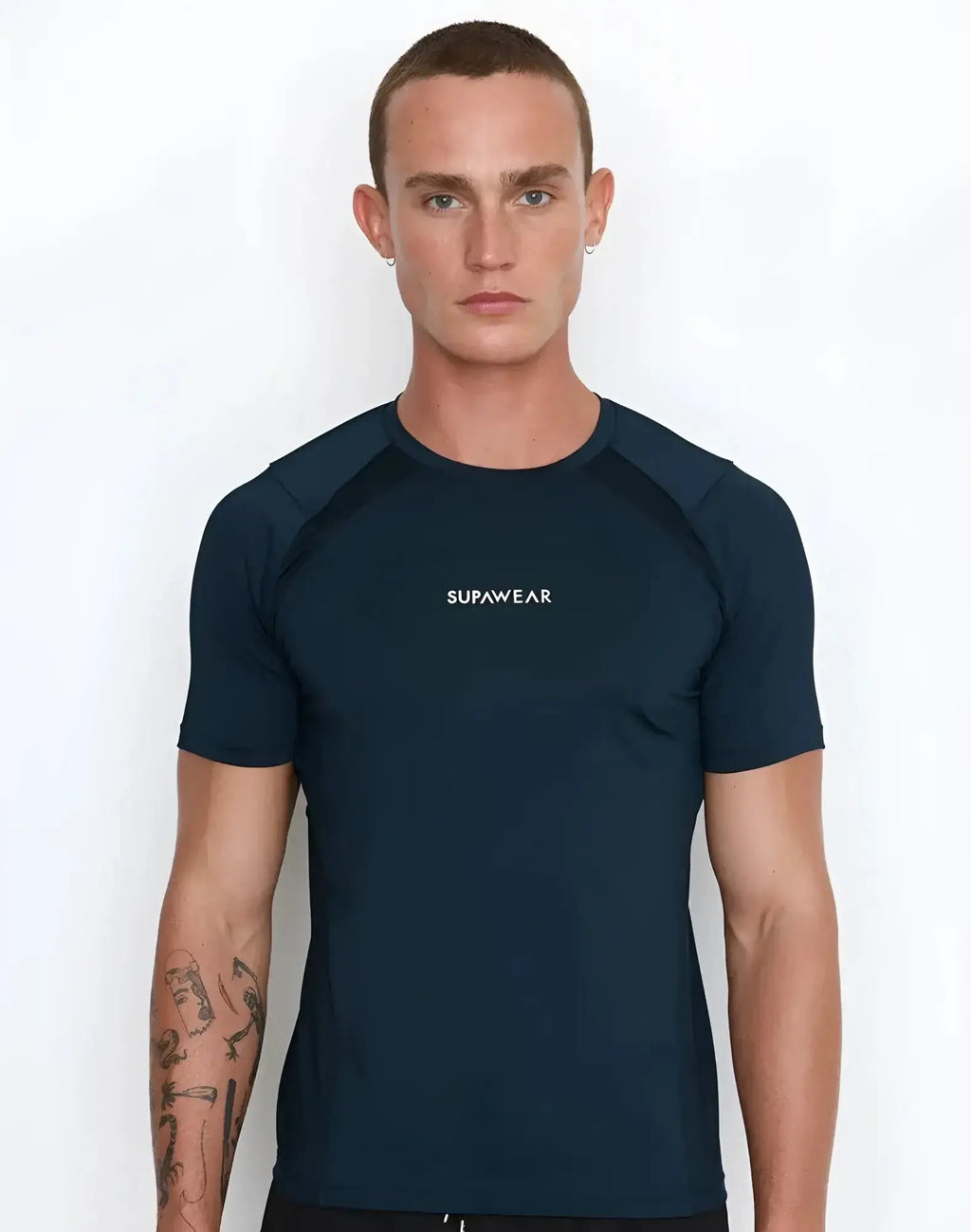 Navy blue short-sleeved rash guard with white supawear logo on chest from the SUPAWEAR Contouring T-Shirt black collection