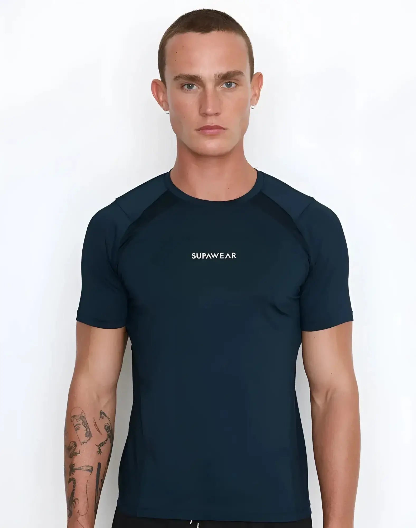 Navy blue short-sleeved rash guard with white supawear logo on chest from the SUPAWEAR Contouring T-Shirt black collection