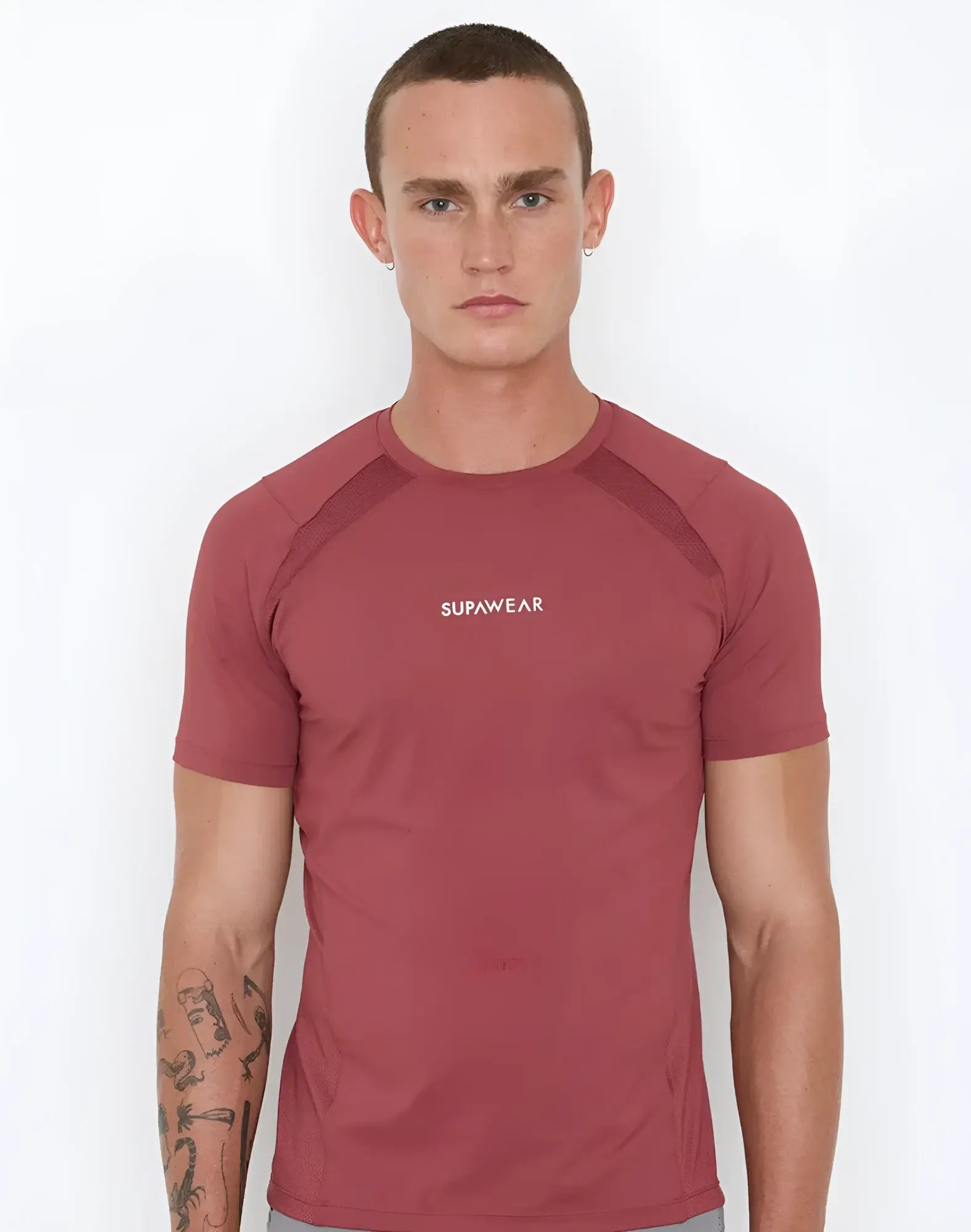 A maroon supawear contouring short-sleeved athletic t-shirt with subtle mesh panels on shoulders and sleeves