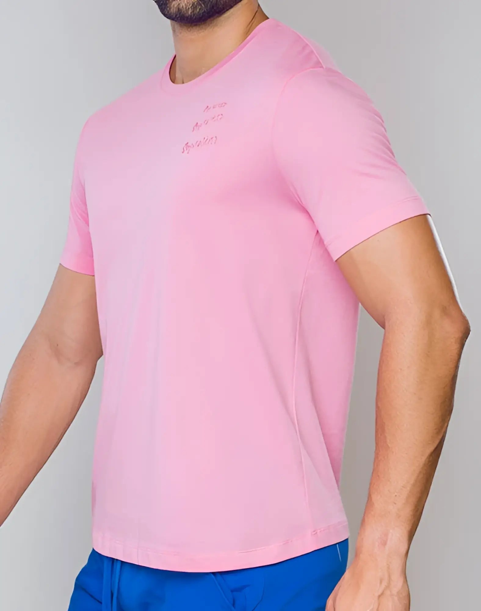 A soft pink supawear crew neck t-shirt with short sleeves and a subtle embroidered logo on the chest