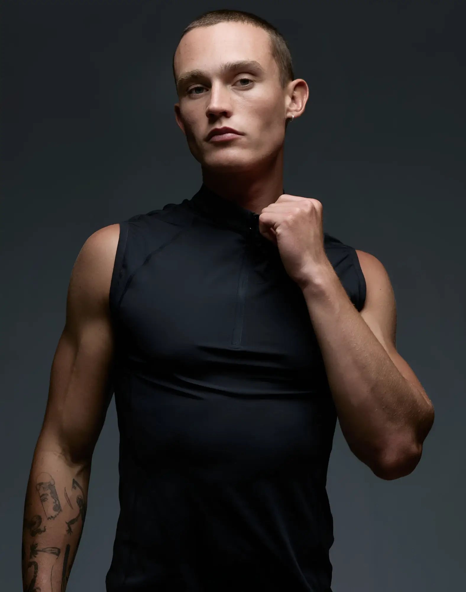 SupaWear Gym2Street black sleeveless athletic top with high collar half-zip detail ideal for gym and streetwear