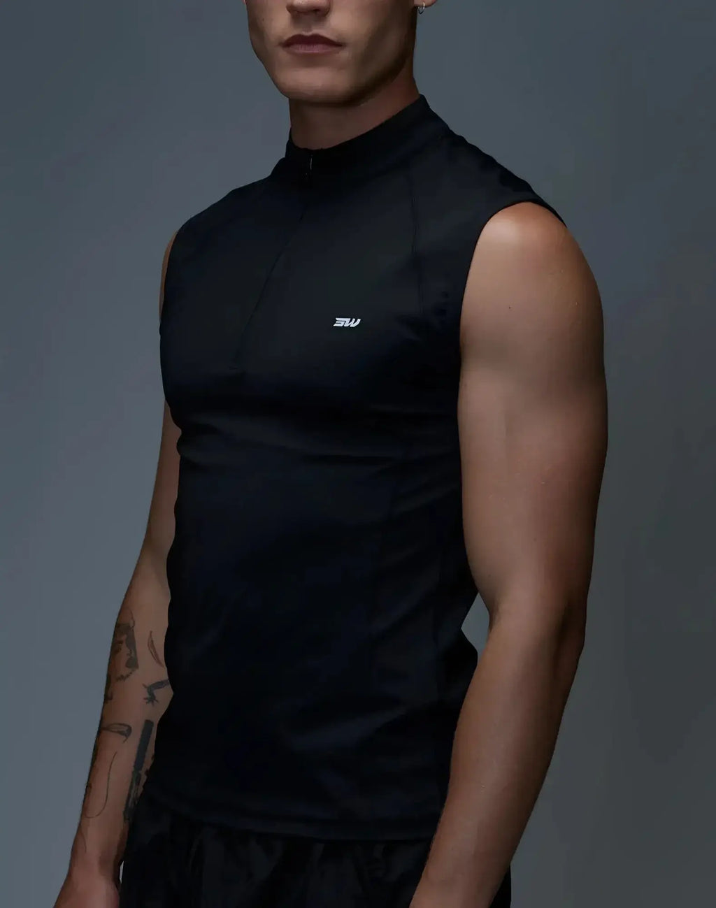 SupaWear Gym2Street black sleeveless half-zip vest with high collar and small white logo on the chest