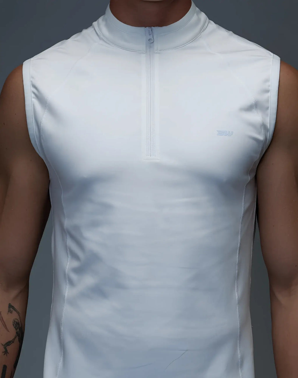 SupaWear gym2street white sleeveless half-zip vest with subtle stitching designed for athletic and casual wear