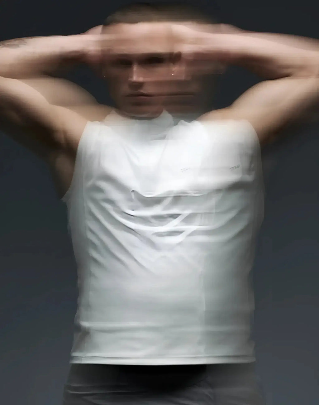 White sleeveless tank top from SUPAWEAR Gym2Street half zip vest designed for gym and street wear