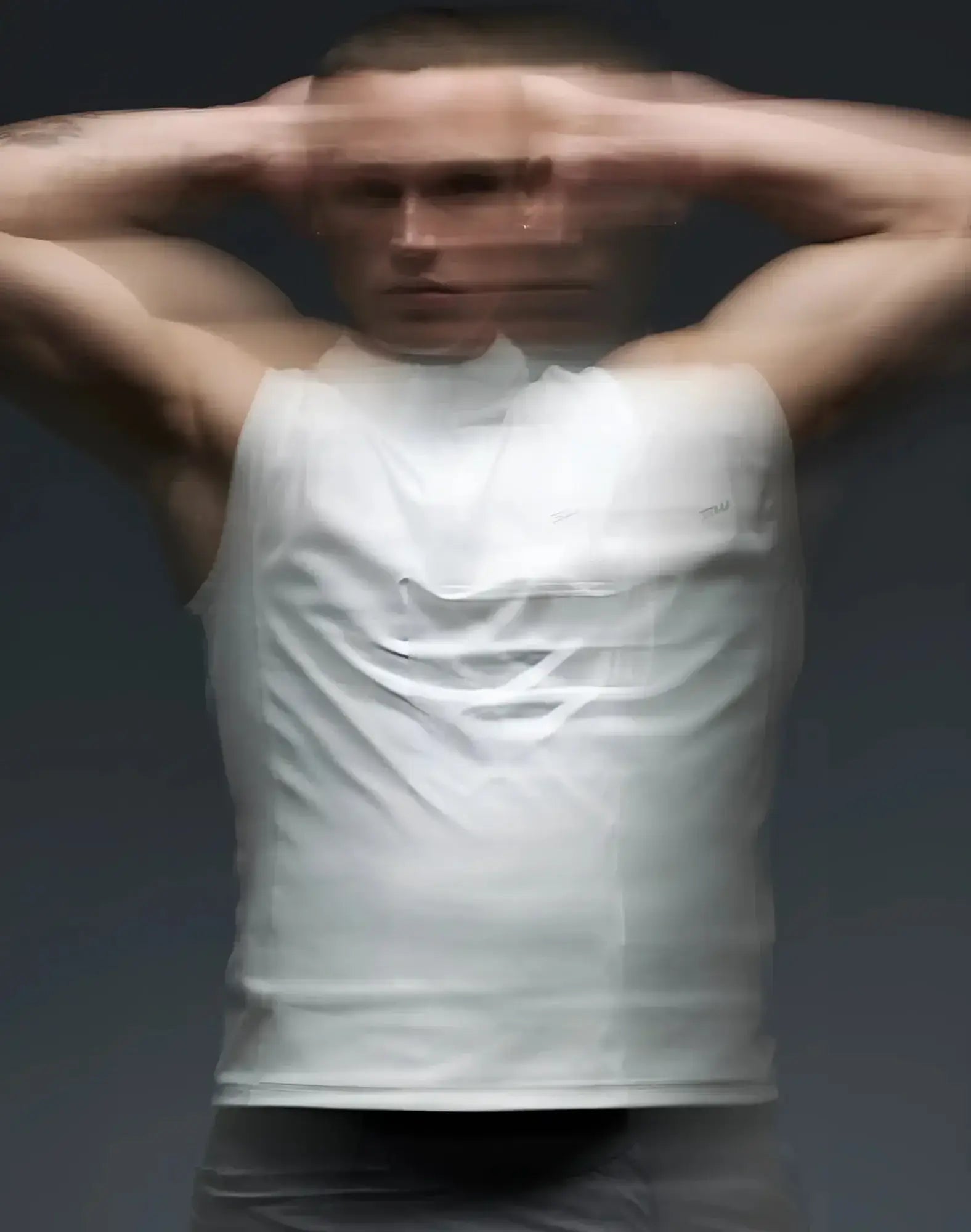 White sleeveless tank top from SUPAWEAR Gym2Street half zip vest designed for gym and street wear