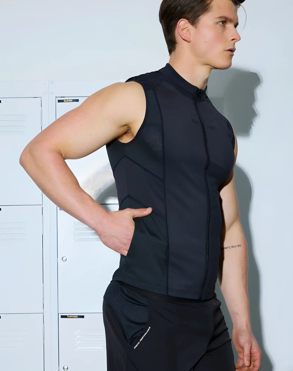 Black sleeveless cycling jersey supawear gym2street zip-up vest with full-length zipper and subtle athletic support paneling