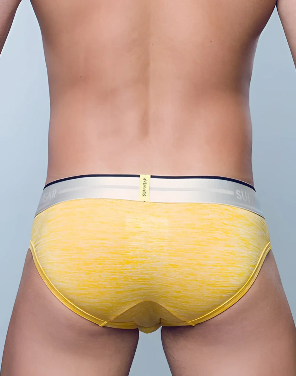 Yellow textured SUPAWEAR Hero brief underwear with white and navy elastic waistband featuring suv logo
