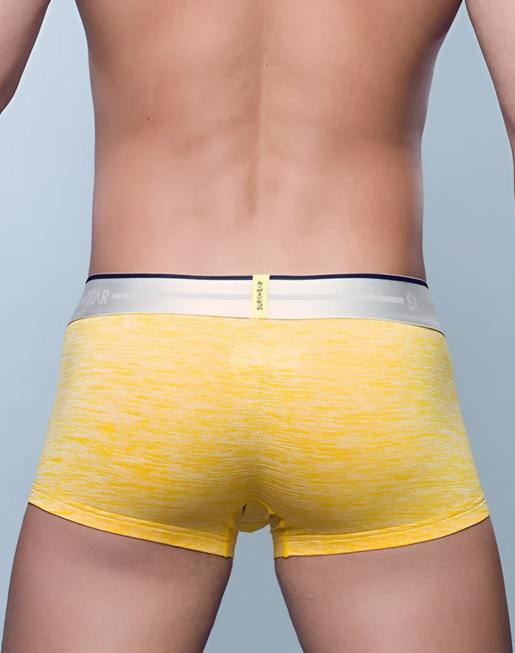 Yellow supawear hero trunk briefs with textured fabric and white navy elastic waistband featuring brand name