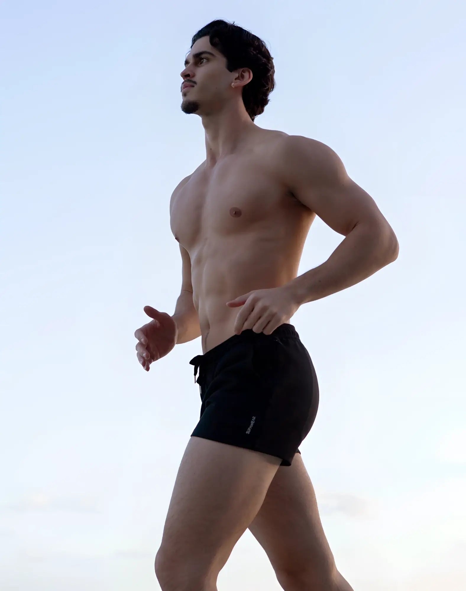 SupaWear jersey shorts in black with a drawstring waistband and a small logo on the lower left leg