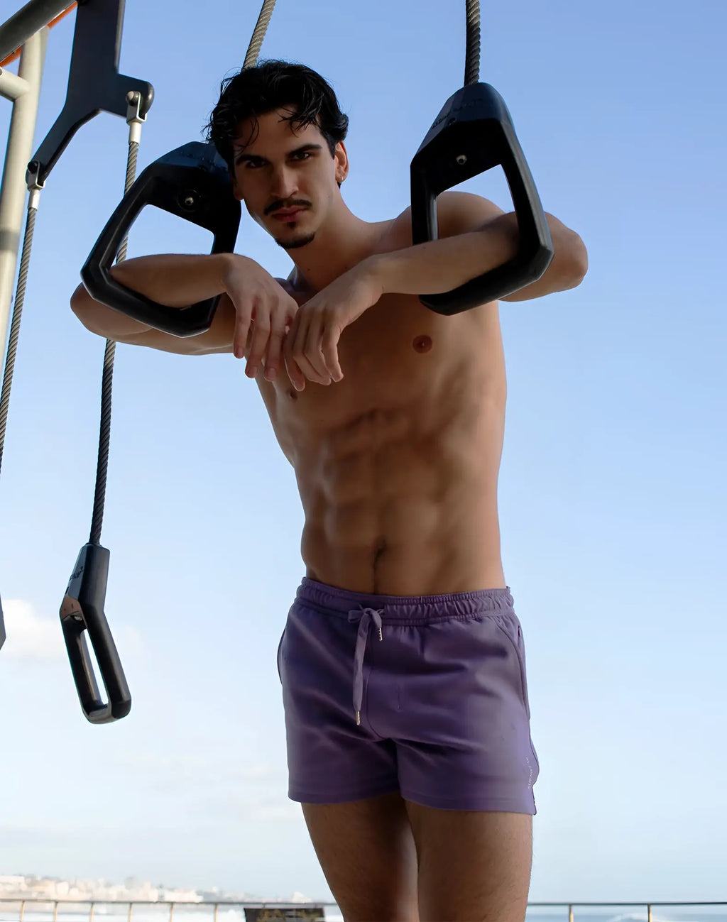 Purple SUPAWEAR jersey swim trunks with drawstring waistband in lavender color for casual beachwear