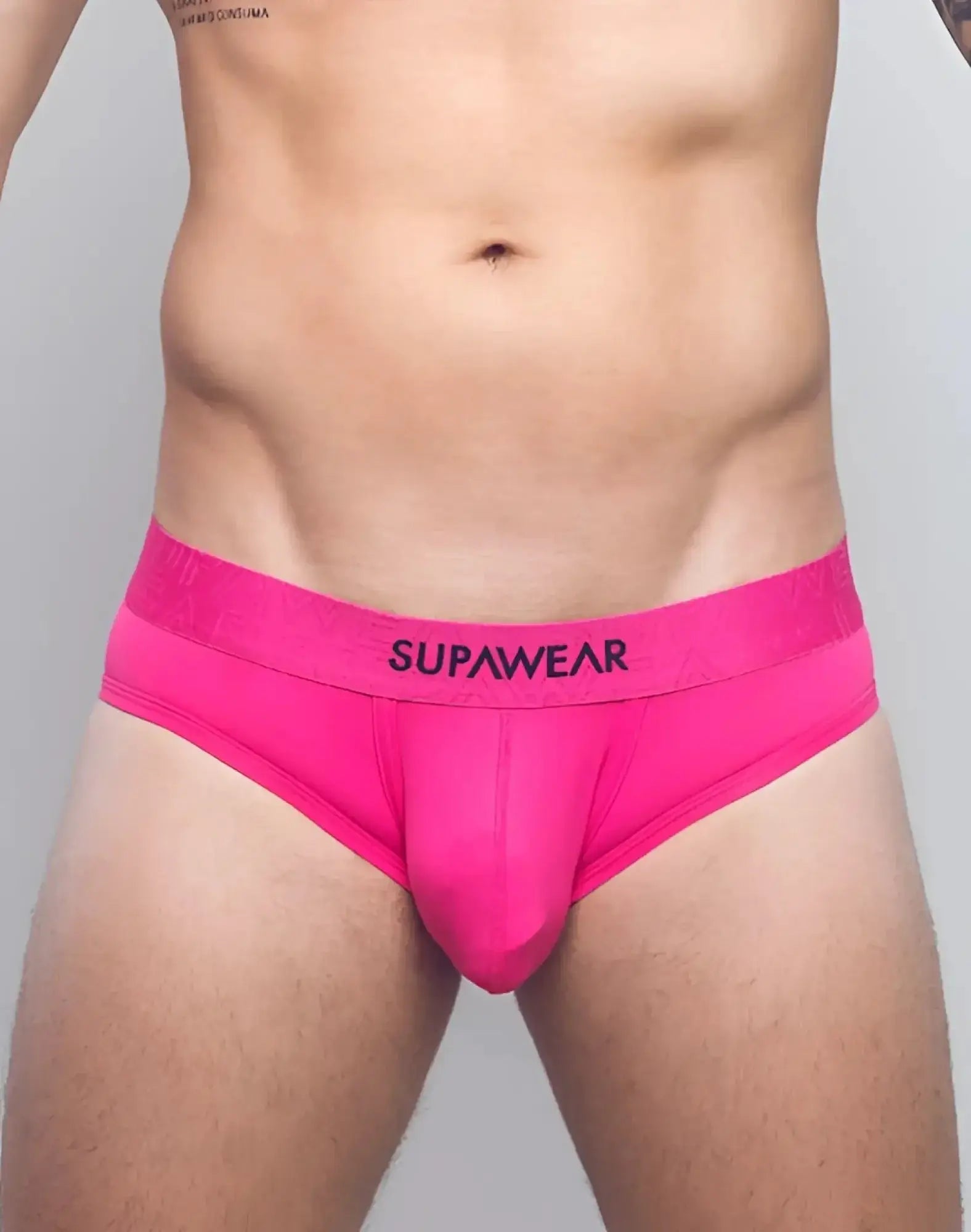 Neon pink supawear briefs with a snug fit and elastic waistband for comfortable everyday wear