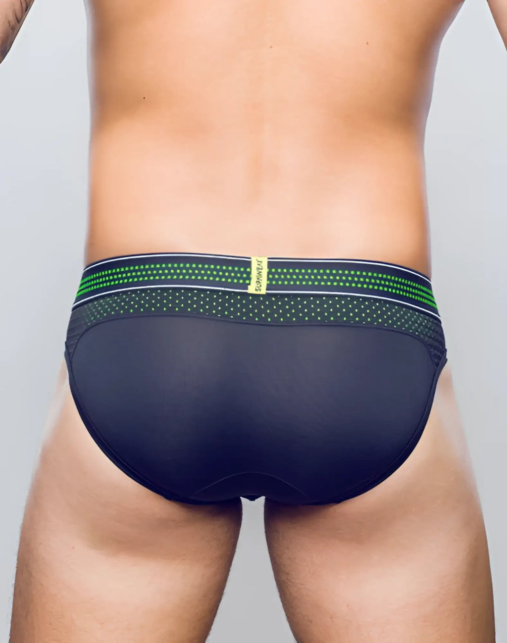 Black supawear neon mesh brief underwear with green and white patterned waistband and rummage brand label