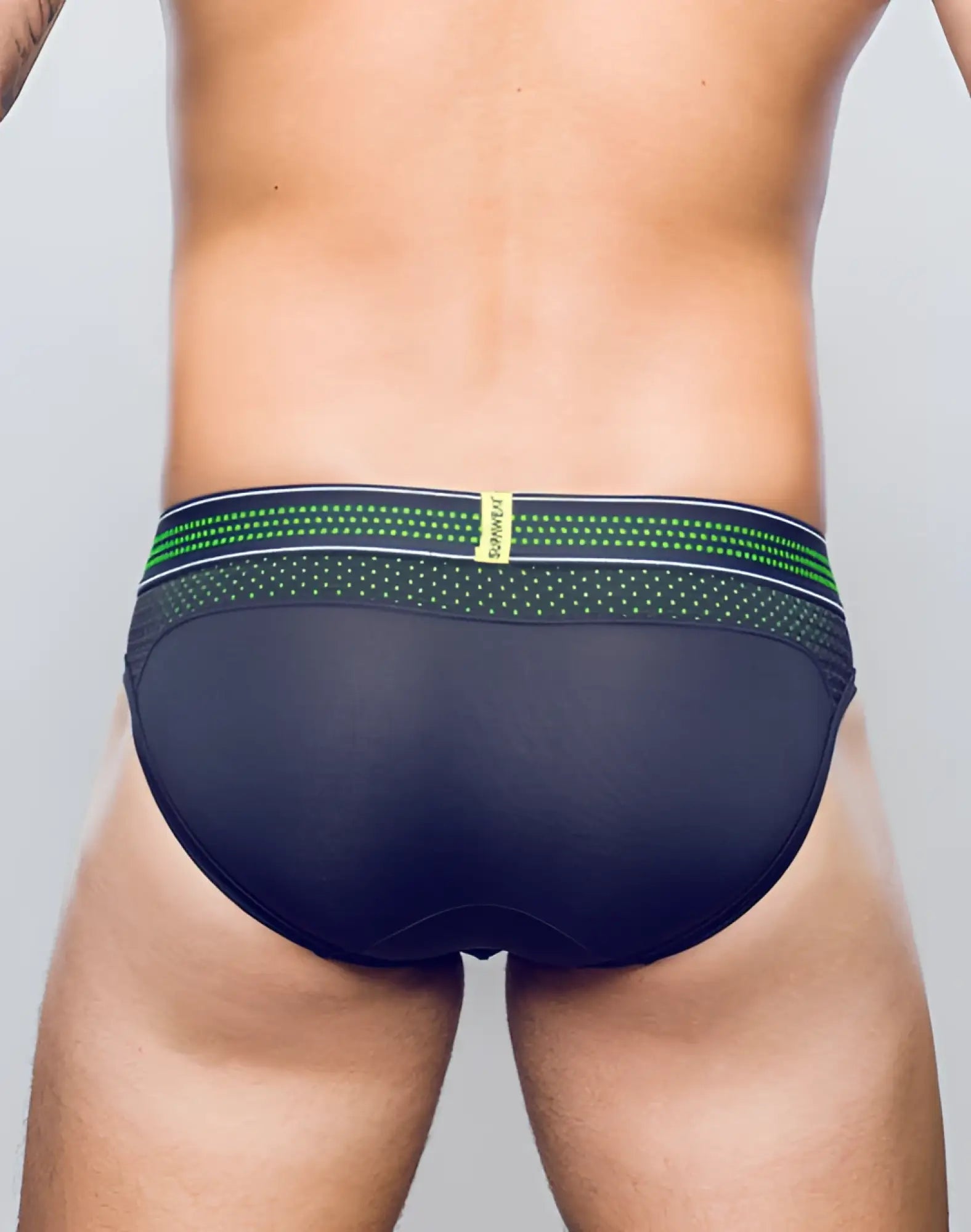 Black supawear neon mesh brief underwear with green and white patterned waistband and rummage brand label