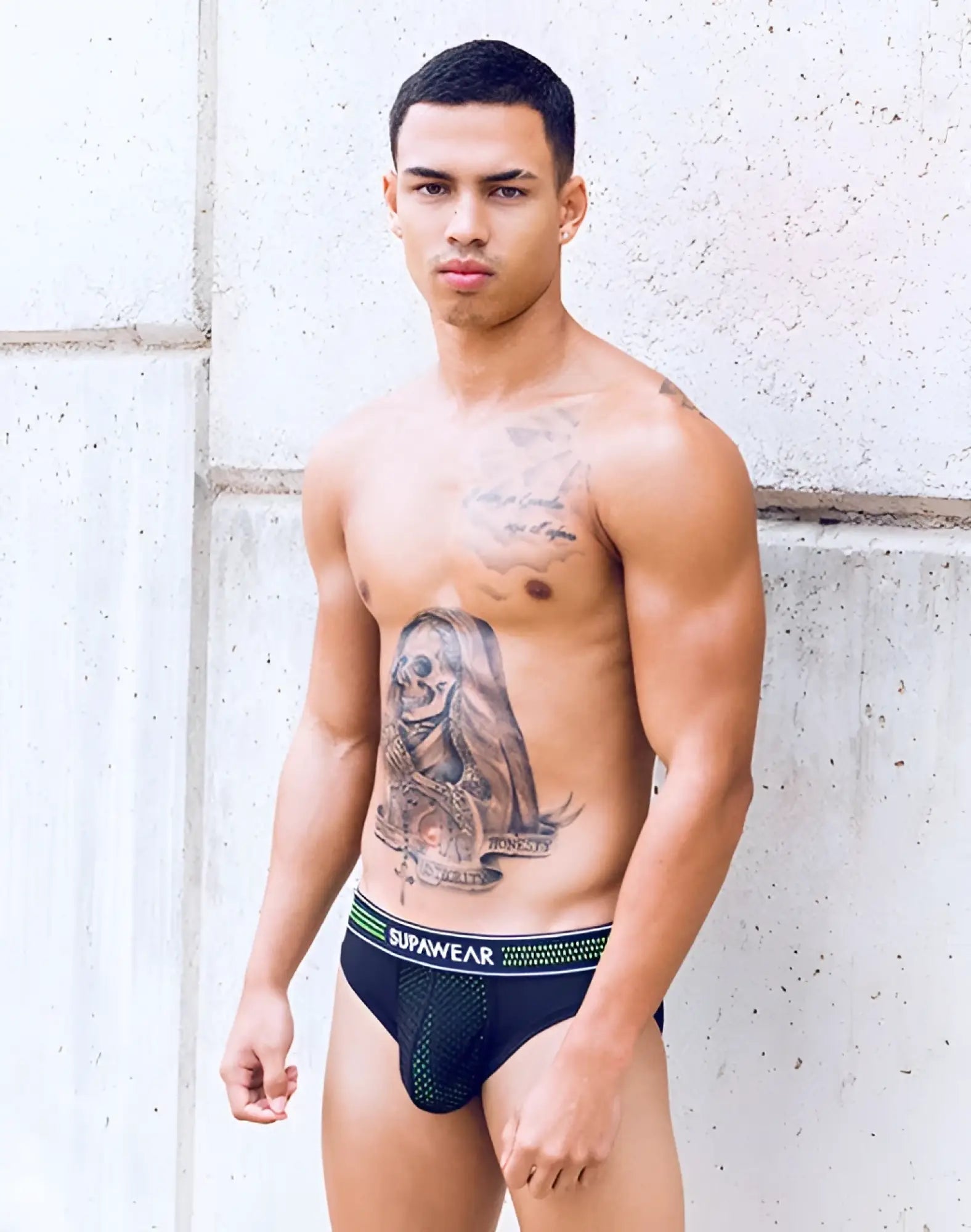 Black mesh supawear briefs with neon green and white trim from supawear neon mesh brief underwear collection