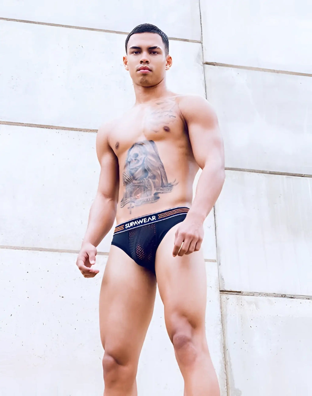 Black mesh supawear neon mesh brief underwear with red white striped waistband in neon orange accents