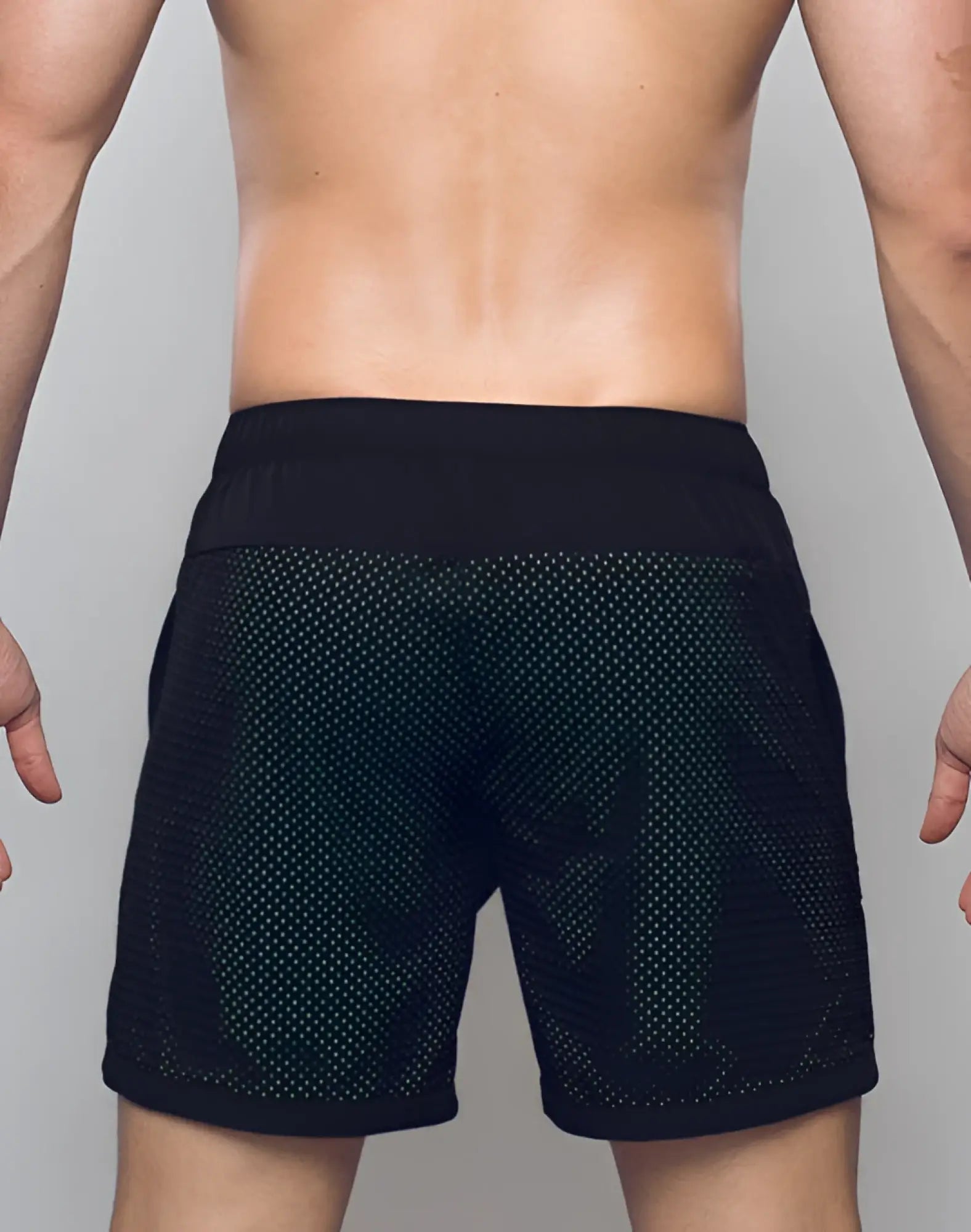 SupaWear neon mesh shorts in black feature subtle green dot patterns on breathable athletic mesh fabric