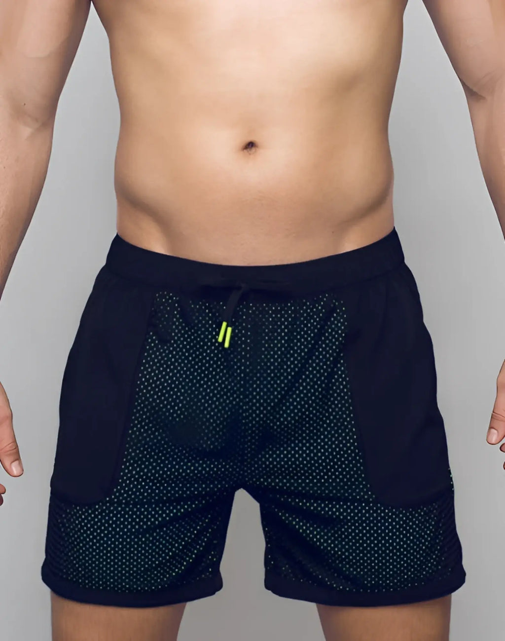 SupaWear neon mesh shorts black with perforated mesh design and neon green drawstring accents for athletic use