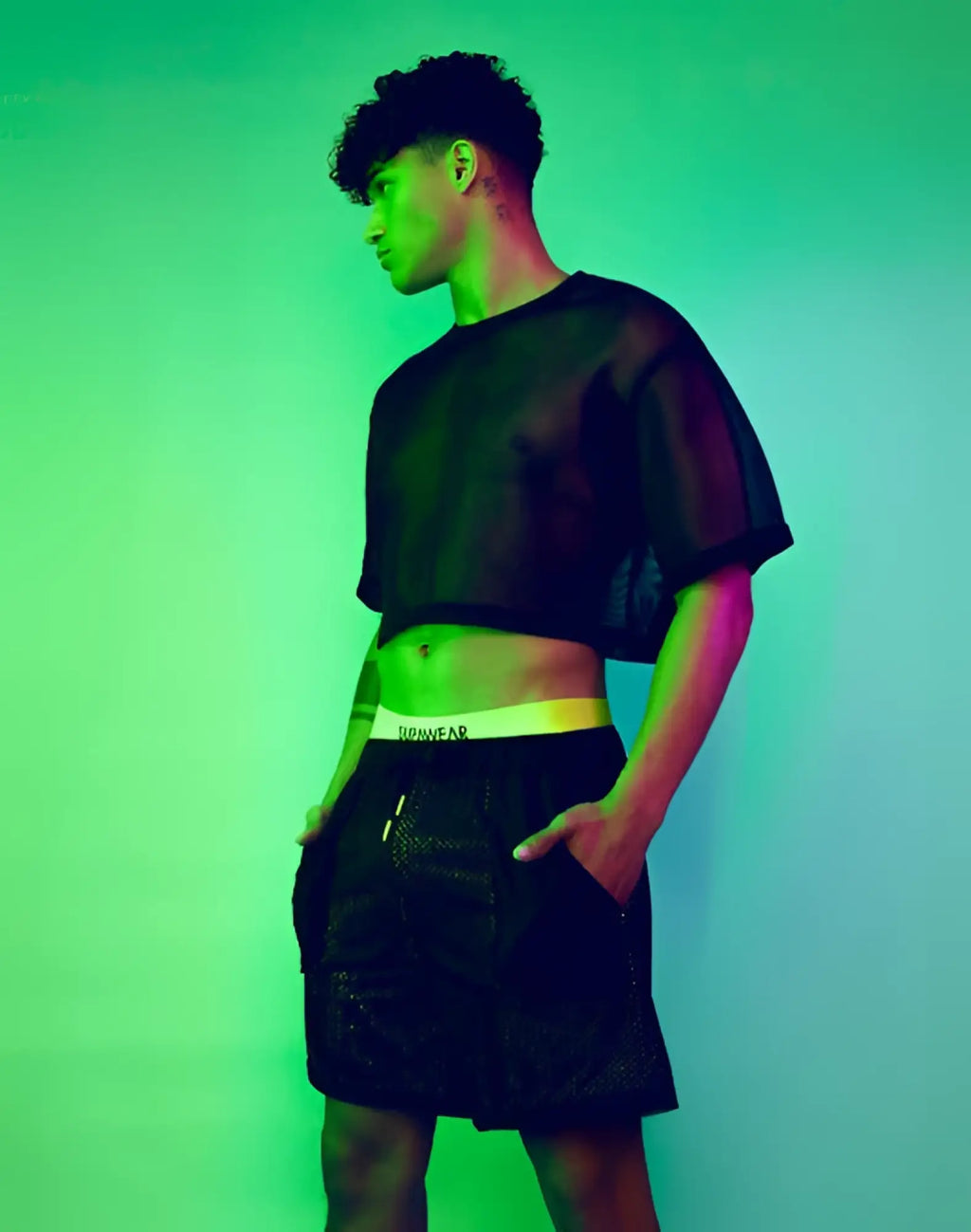 Black mesh crop top with short sleeves and cropped hemline from supawear neon mesh shorts black neon collection