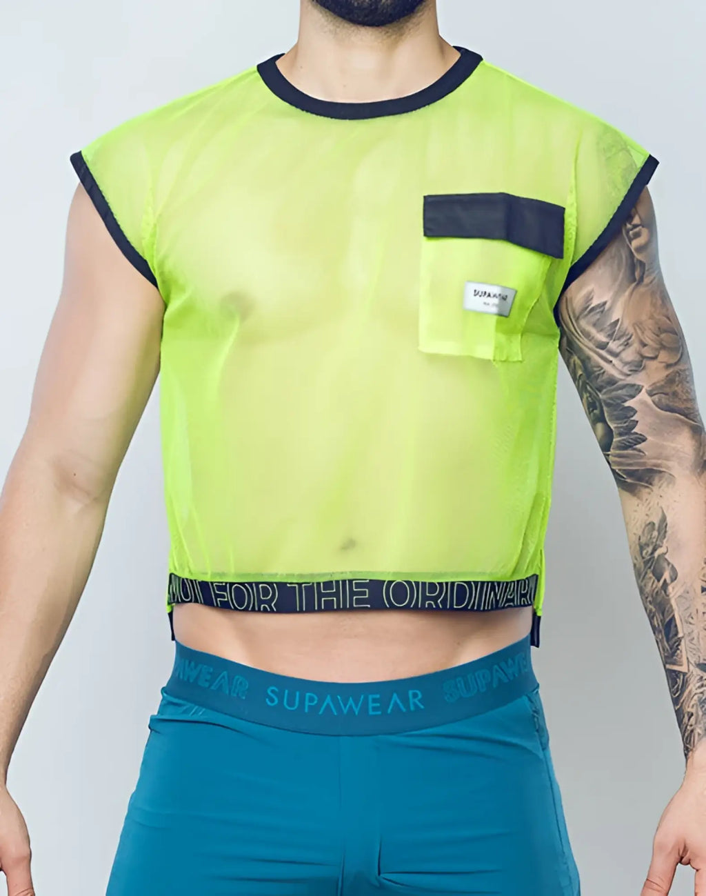SupaWear neon green mesh crop top with black trim and front pocket for stylish breathable wear