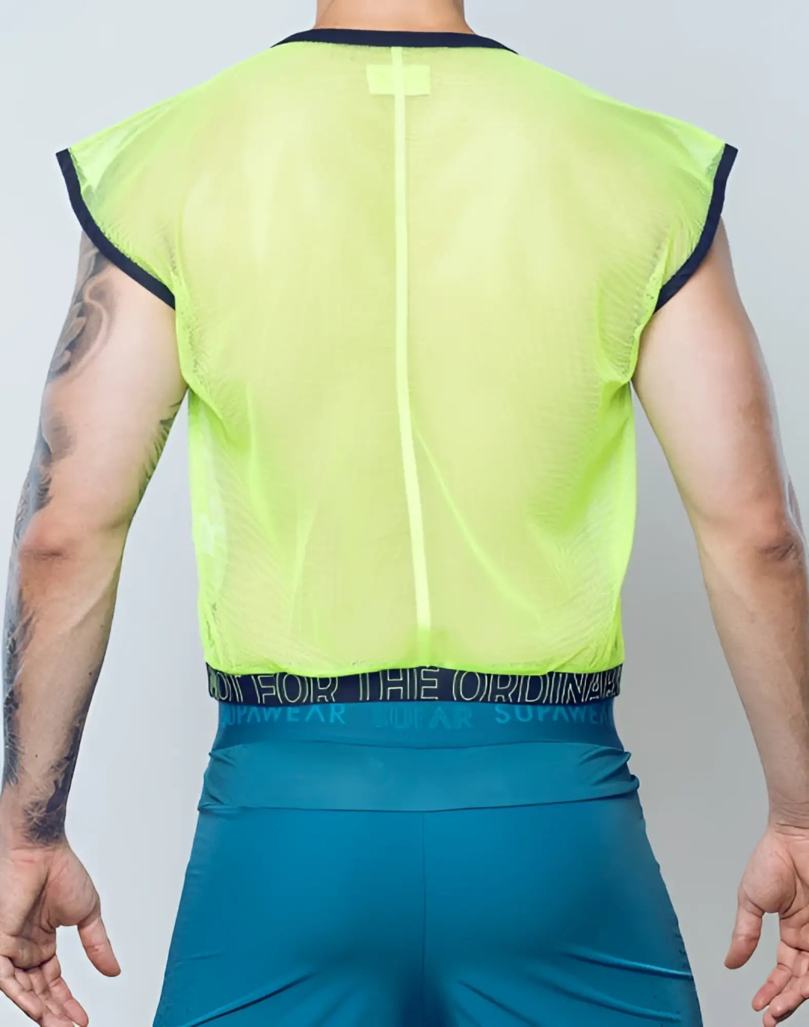 SupaWear neon mesh top in neon yellow with black trim and central zipper sleeveless design