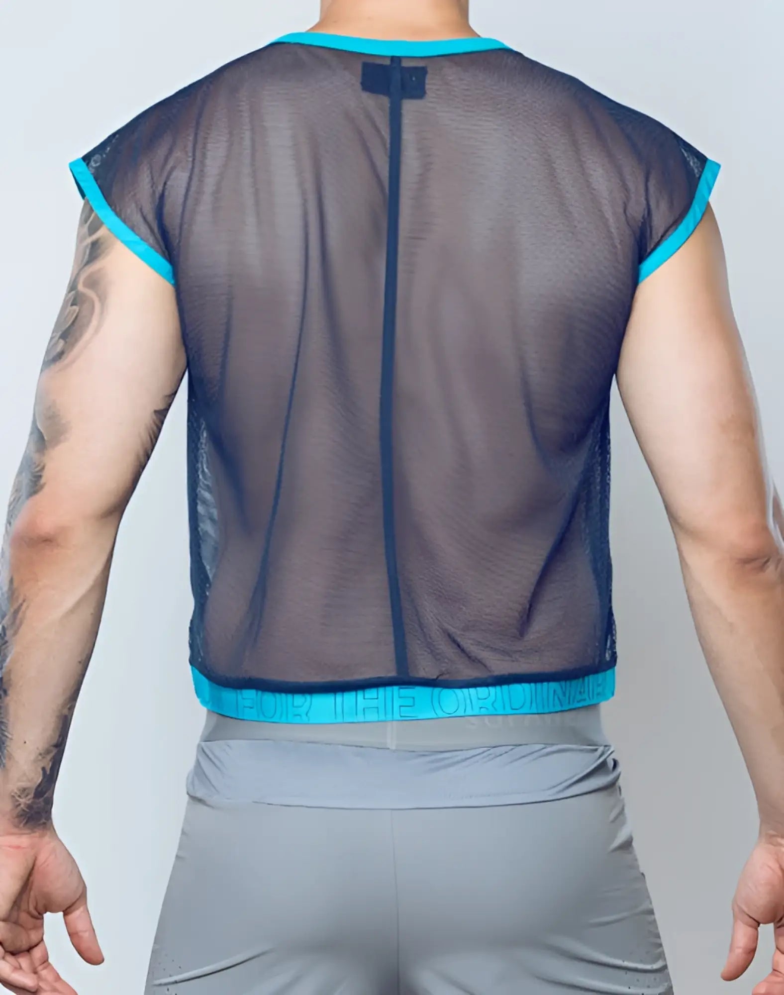 SupaWear neon mesh top navy blue with bright turquoise trim on neckline armholes and hem short sleeves